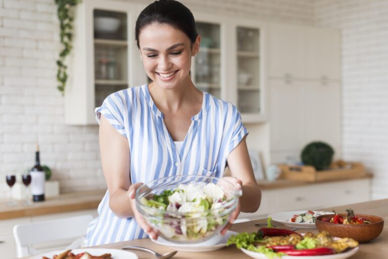 medium-shot-smiley-woman-holding-bowl